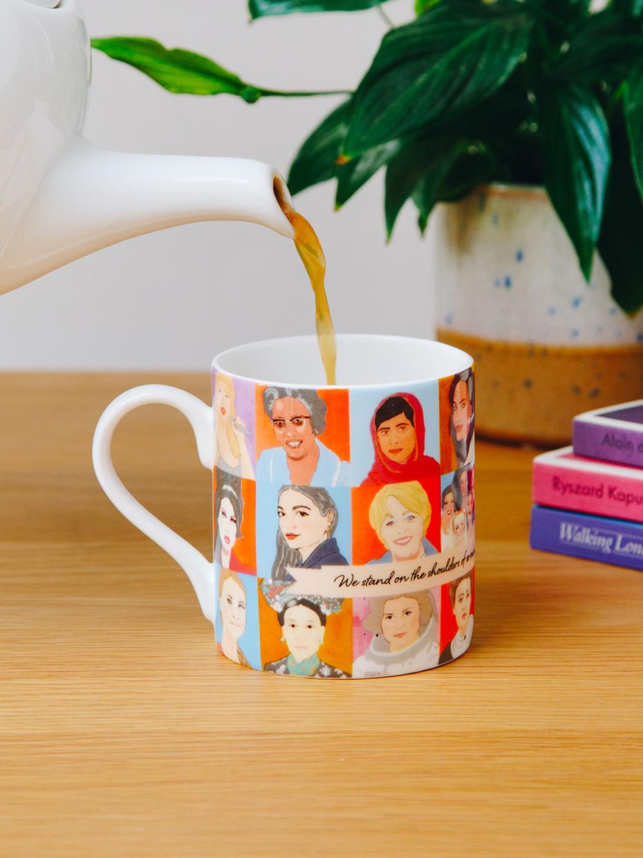 Phenomenal Women Mug by Talking Tables. This beautifully illustrated china mug features portraits of various inspirational women including Frida Kahlo, Oprah Winfrey, Ruth Bader Ginsburg, Amelia Earhart and Malala Yousafzai.
